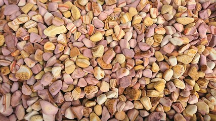 spread colorful cobblestone on the ground