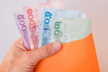 Thailand Baht, Chinese Yuan, US Dollar banknotes and Thailand Baht coin. calculation amount of money.