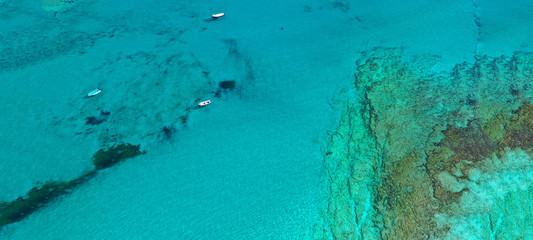 Aerial drone ultra wide photo of beautiful tropical exotic paradise Tahiti island turquoise sandy...