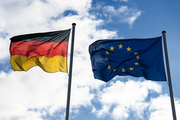 State flag of Federal Republic of Germany and the flag of the European Union.