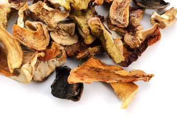 Top view of dried homemade mushrooms isolated on a white background in close-up.