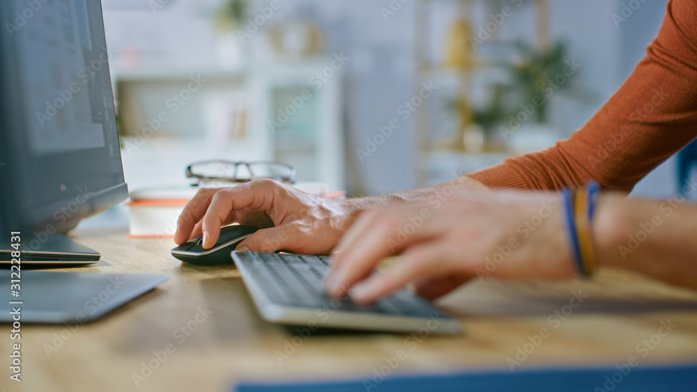 Poster handsome software engineer works on a ux / ui mobile app template, uses personal computer. freelance