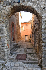 Fototapeta premium Castropignano, Italy, 12/24/2019. The arched entrance into a medieval village