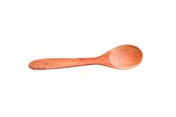 Spoon made of natural painted brown wood, isolated on a white background, close-up