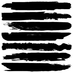 Collection of vector grunge brushes. Paint strokes with a dry brush. Abstract ink blots on a white background