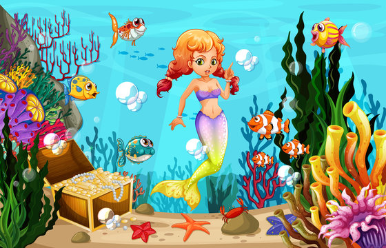 Mermaid and many fish under the ocean