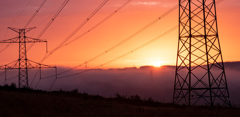 high voltage post,High voltage tower sky surise background