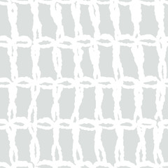 Hand drawn imperfect yet organized geometrical pattern, imitating  crochet texture. Light gray silver and white colors. Monochrome eco friendly hand crafted seamless vector repeat.