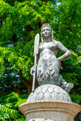19th-century Ponte delle Sirenette or Bridge of Mermaids statue at Parco Sempione or Sempione Park in Milan, Lombardy Italy