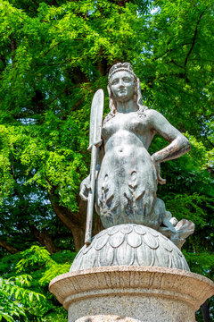 19th-century Ponte delle Sirenette or Bridge of Mermaids statue at Parco Sempione or Sempione Park in Milan, Lombardy Italy