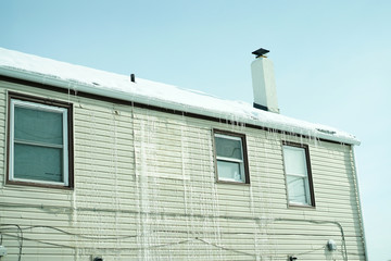 Long icicles on front of the house.