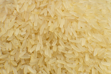 Long grain white rice background. Macro. Rice texture. Top view