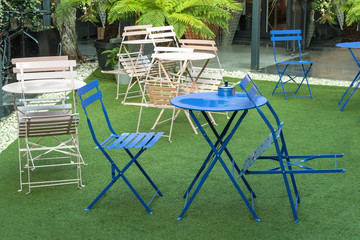 Empty cafe on coronavirus quarantine crisis. Tables and chairs of a street cafe