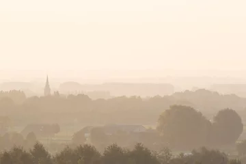 Fototapeten Zicht op Bellegem tijdens een mistige ochtend, Kortrijk, Belgium © krist