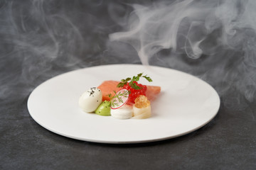 Salmon, trout with quail egg creamy mousse and green mayonnaise