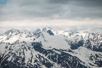 Fototapeta na wymiar Beautiful views of snow-capped mountains. background