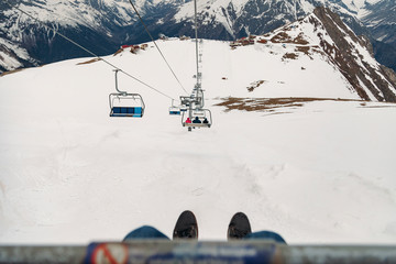 first-person view ski chair lift ropeway at the ski resorеt