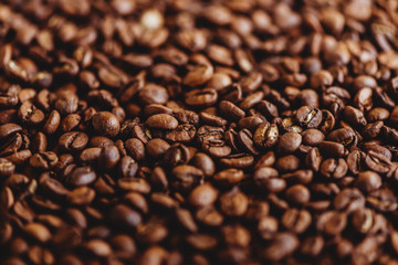 Coffee grains. Background of roasted coffee beans brown. layout. Flat lay.