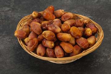 Sweet tasty dry dates in the basket