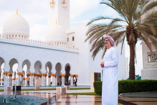 Arab man visiting the Grand Mosque in Abu Dhabi