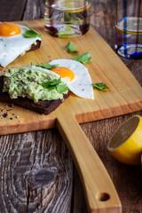 Brunch on Valentine's Day,  avocado toasts with fried egg