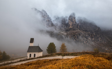 Fototapeta na wymiar The church of cappella di san Maurizio at the Passo gardena pass in the Dolomites of the South Tyrol in Italy.