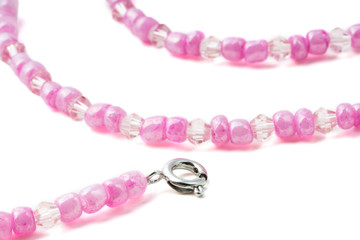 A set of handmade jewelry from a necklace and bracelet. Made of large pink glass beads and bicones.