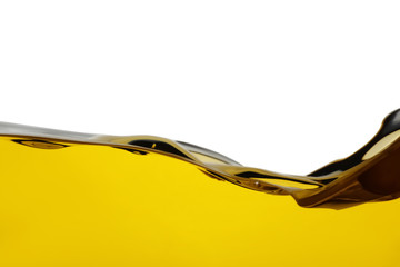 Cooking oil flow isolated on white. Color liquid