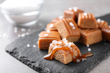 Salted caramel on slate board, closeup view