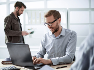 close up. employees of the company work with documentation