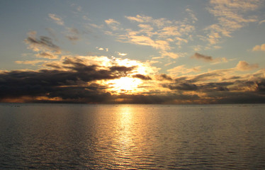 Young Christmas sun over the horizon