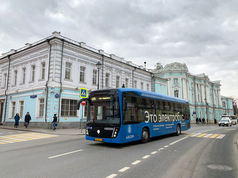 Moscow, Russia, December, 21, 2019. Electrobus goes down the street Pokrovka in the winter. city Moscow, Russia