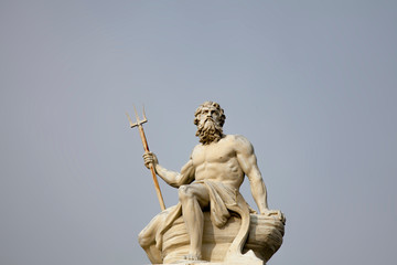 The ancient statue of mighty god of seas and oceans Neptune (Poseidon) - obrazy, fototapety, plakaty