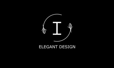 Design of modern monogram on black background with letter I. Vector floral logo.