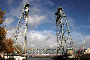 Fototapeta na wymiar Steel vertical bridge over river Gouwe at Waddinxveen in the Netherlands