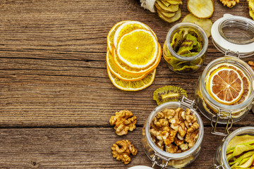 Zero waste food shopping concept. Assortment of dried fruits, walnuts. Sustainable lifestyle