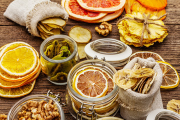 Zero waste food shopping concept. Assortment of dried fruits, walnuts. Sustainable lifestyle
