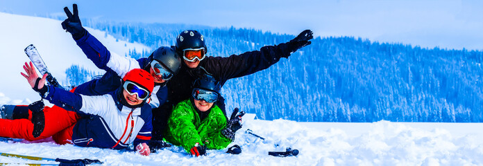Group of friends with ski on winter holidays - Skiers having fun on the snow