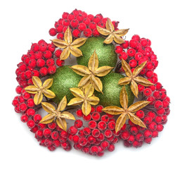 Christmas decorative composition with balls, stars and berries isolated on a white background. Top view, flat lay
