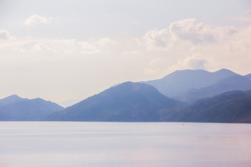 Skadar lake view, Montenegro, in a misty early blue morning