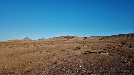 Landscape and sunset on the coast contemplating the breaking of the waves on the cliffs