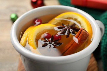Delicious aromatic mulled wine on table, closeup