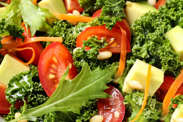 Tasty fresh kale salad as background, closeup
