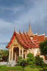 Fototapeta premium Buddhist temple in Wat Chalong complex, located in Phuket, Thailand. Exterior view.