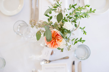 top down table setting with a pink rose