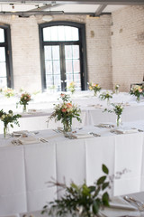 Fototapeta na wymiar wedding reception hall table settings 