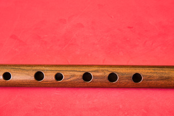 quena (from Quechua quena) traditional wind instrument used by the inhabitants of the central Andes.Peru, made with llama bone