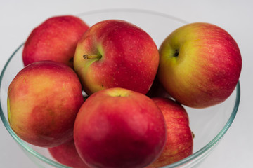 Apples in a glass bowl. 