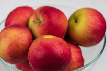 Apples in a glass bowl. 