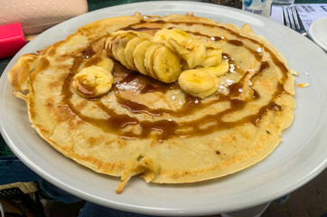 pancake with syrup and banana